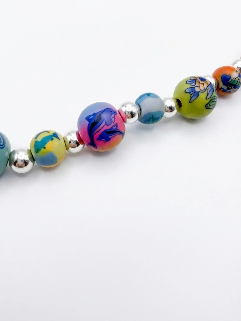 Viva clay bead phone case charm. With ocean wildlife.